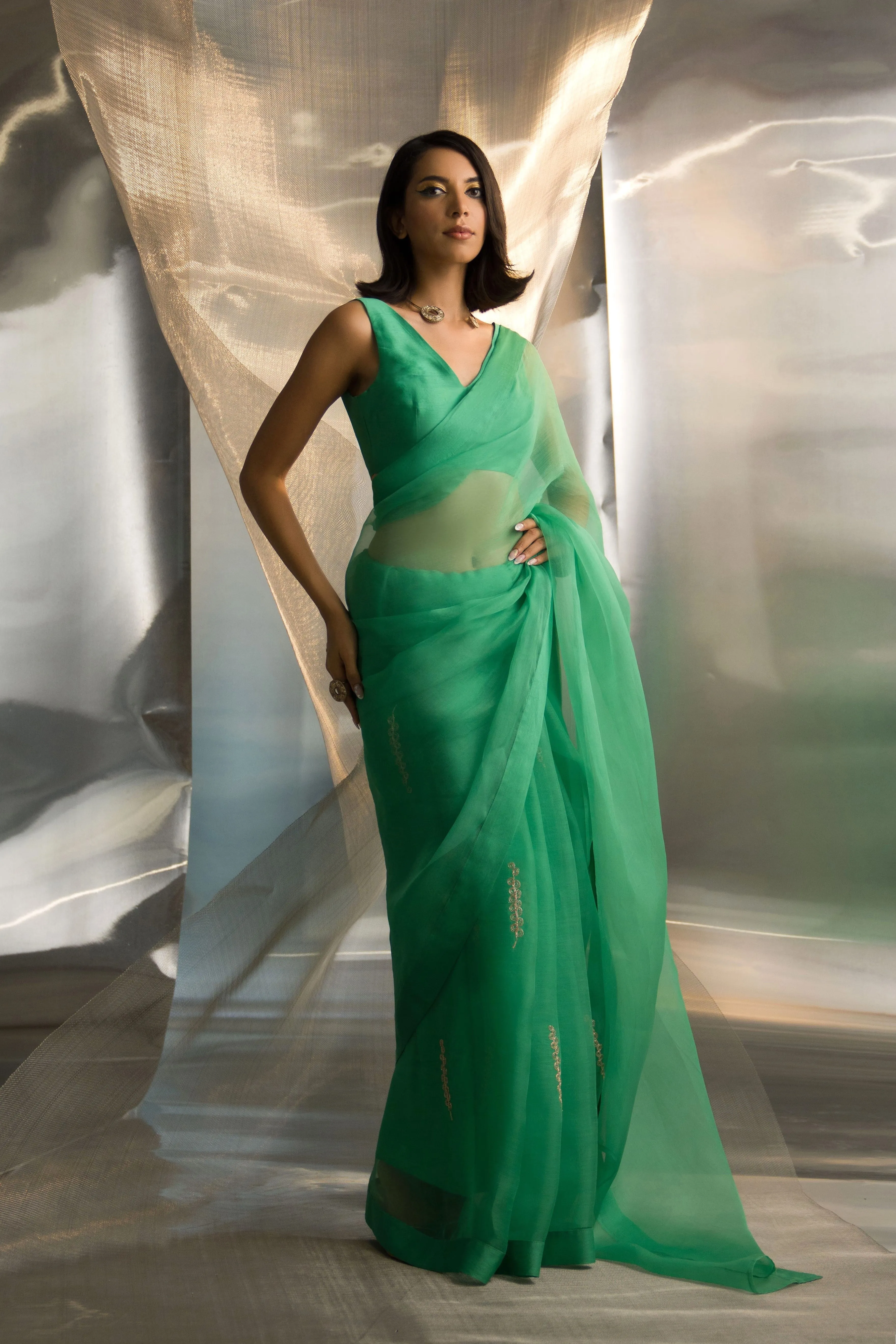 Lush Green Organza Saree With Sleeveless Blouse